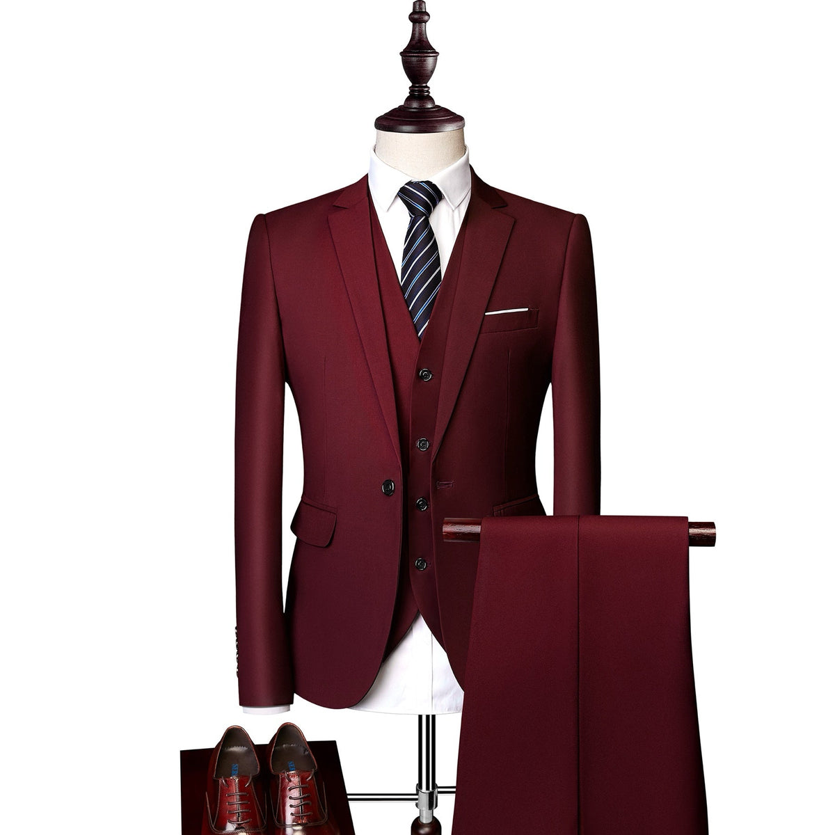 A collection of men's slim fit 3 piece suits in various colors, including blue, pink, white, red, and more, displayed on