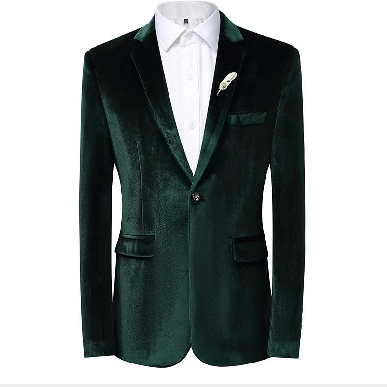A collection of men's velvet suits in blue, red, gold, purple, and green, each featuring a one-button blazer with a feather
