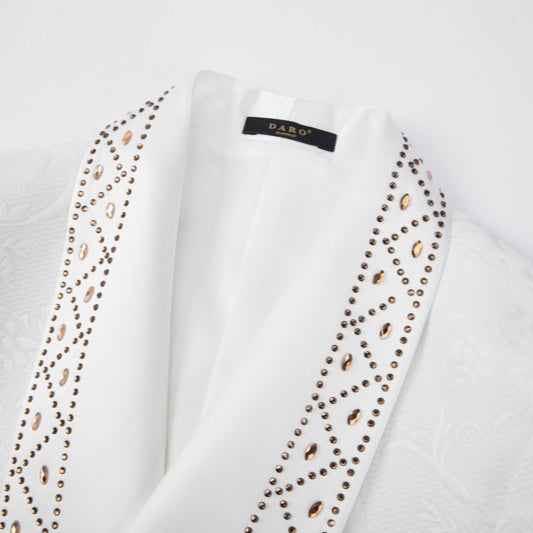 Front view of a men's white double-breasted blazer with gold studded and rhinestone-embellished shawl lapels, featuring a