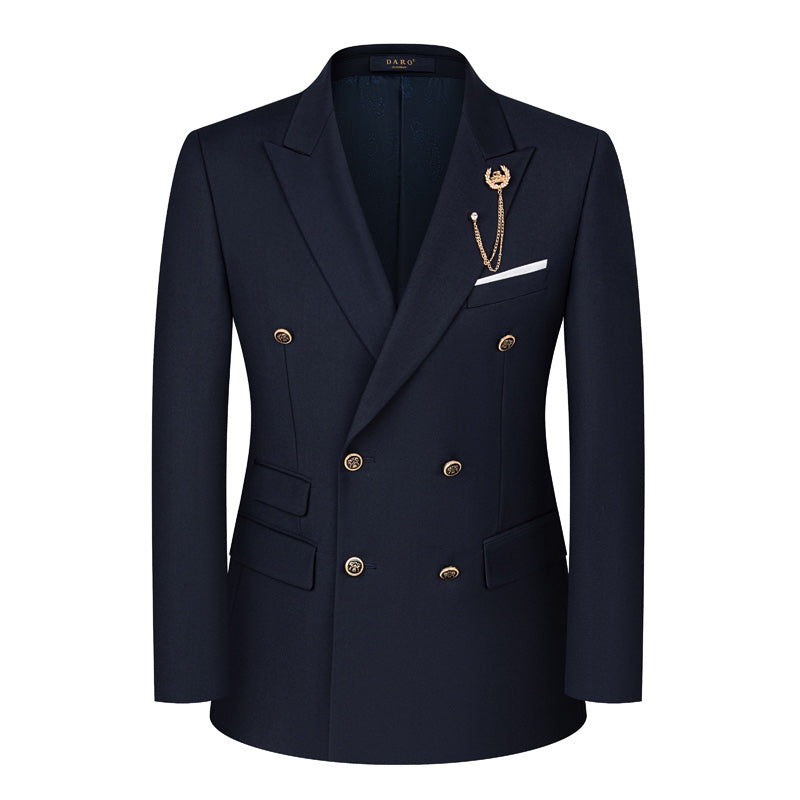 Full view of a men's navy double-breasted suit with gold buttons, a peak lapel, and a decorative brooch, paired with matching