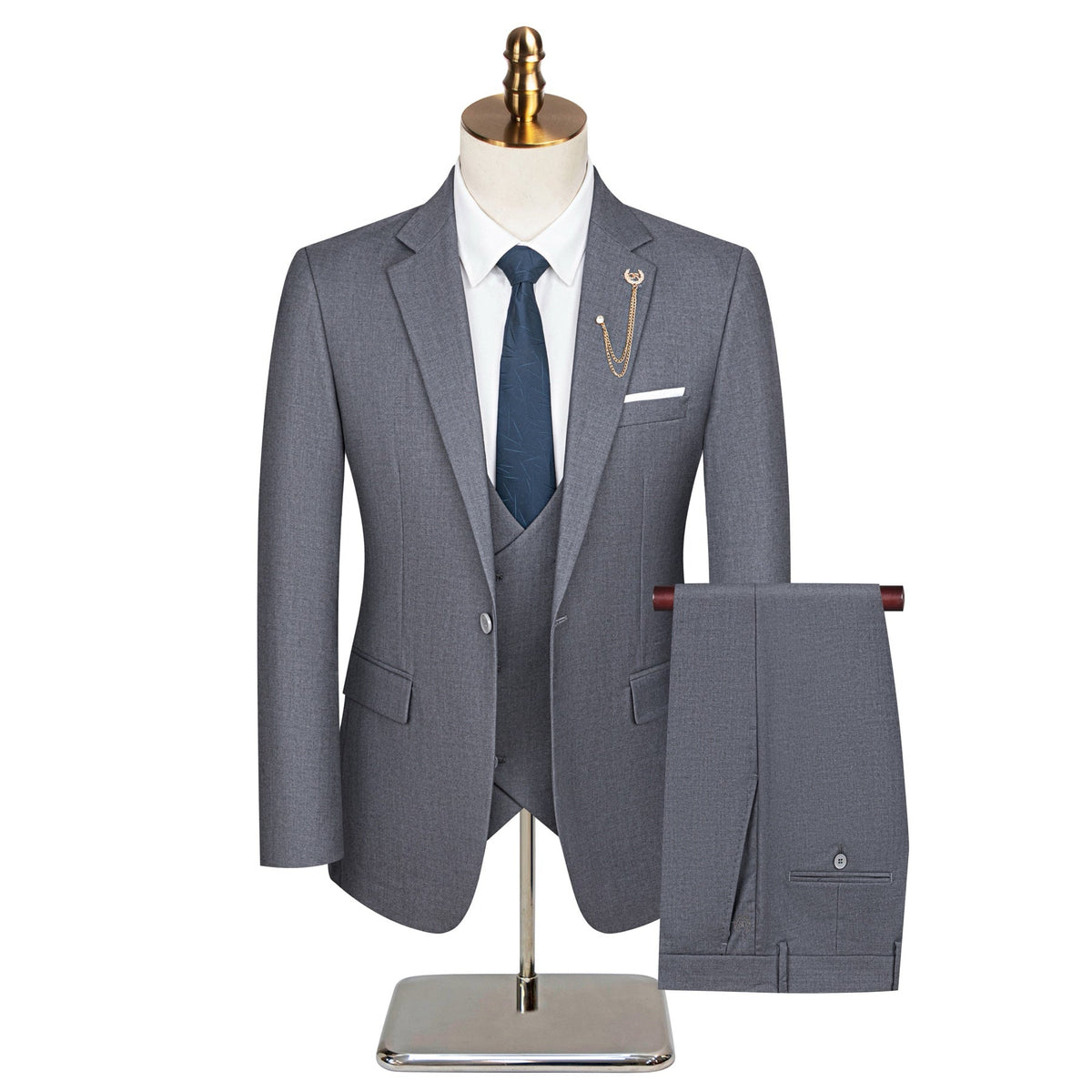 Men's grey three-piece slim fit suit with single-breasted jacket, double-breasted vest, and flat-front trousers, styled with