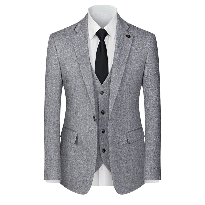 A men's grey textured three-piece suit with a single-breasted jacket, vest, and trousers, featuring black elbow patches on