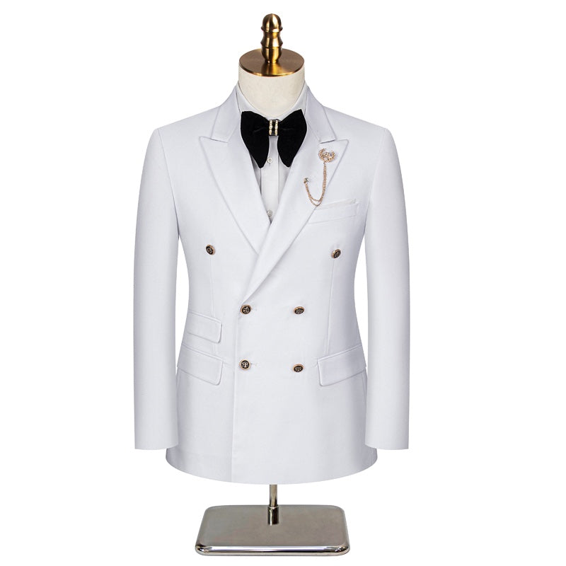 A men's white double-breasted suit with gold buttons, peaked lapels, and a decorative brooch, displayed on a mannequin.