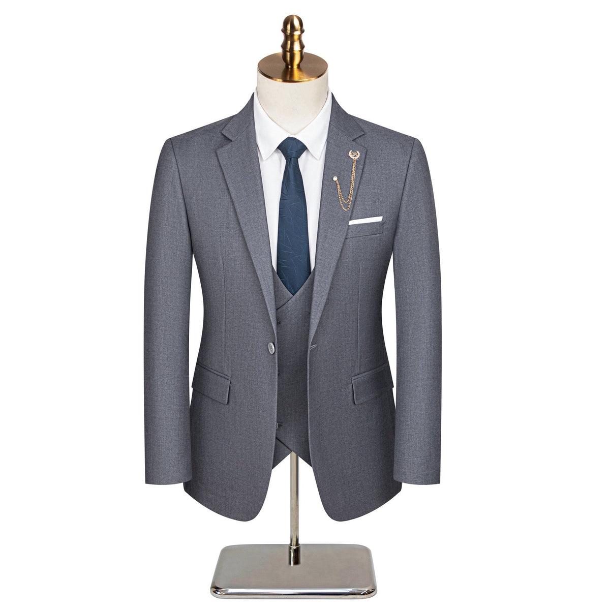 Men's grey three-piece slim fit suit with single-breasted jacket, double-breasted vest, and flat-front trousers, styled with
