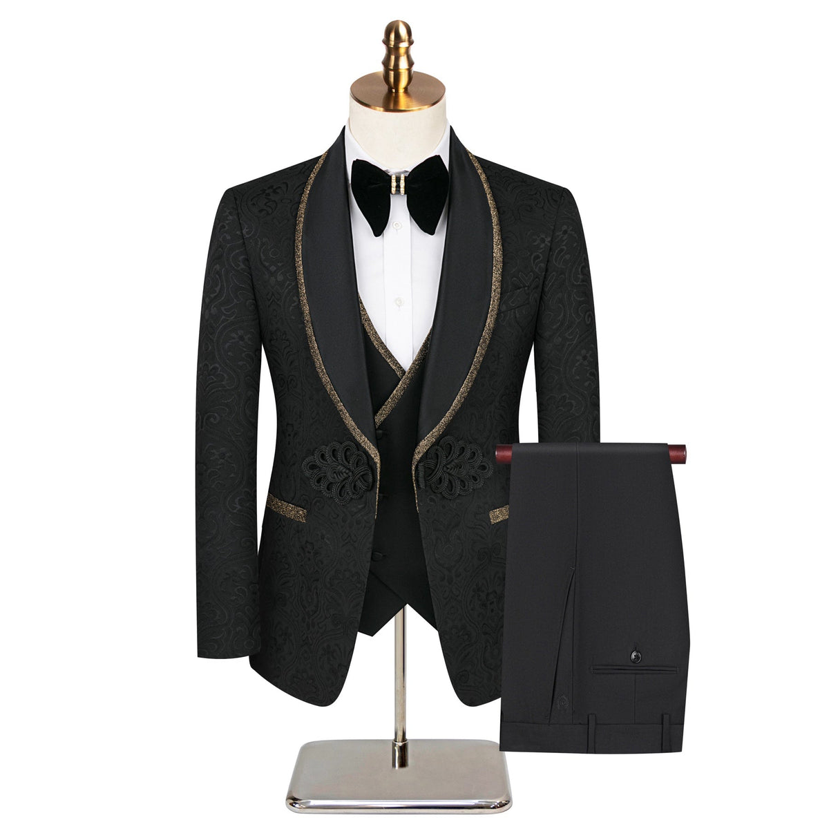 A black men's 3-piece jacquard suit with gold glitter trim on the lapels and vest, displayed on a mannequin.