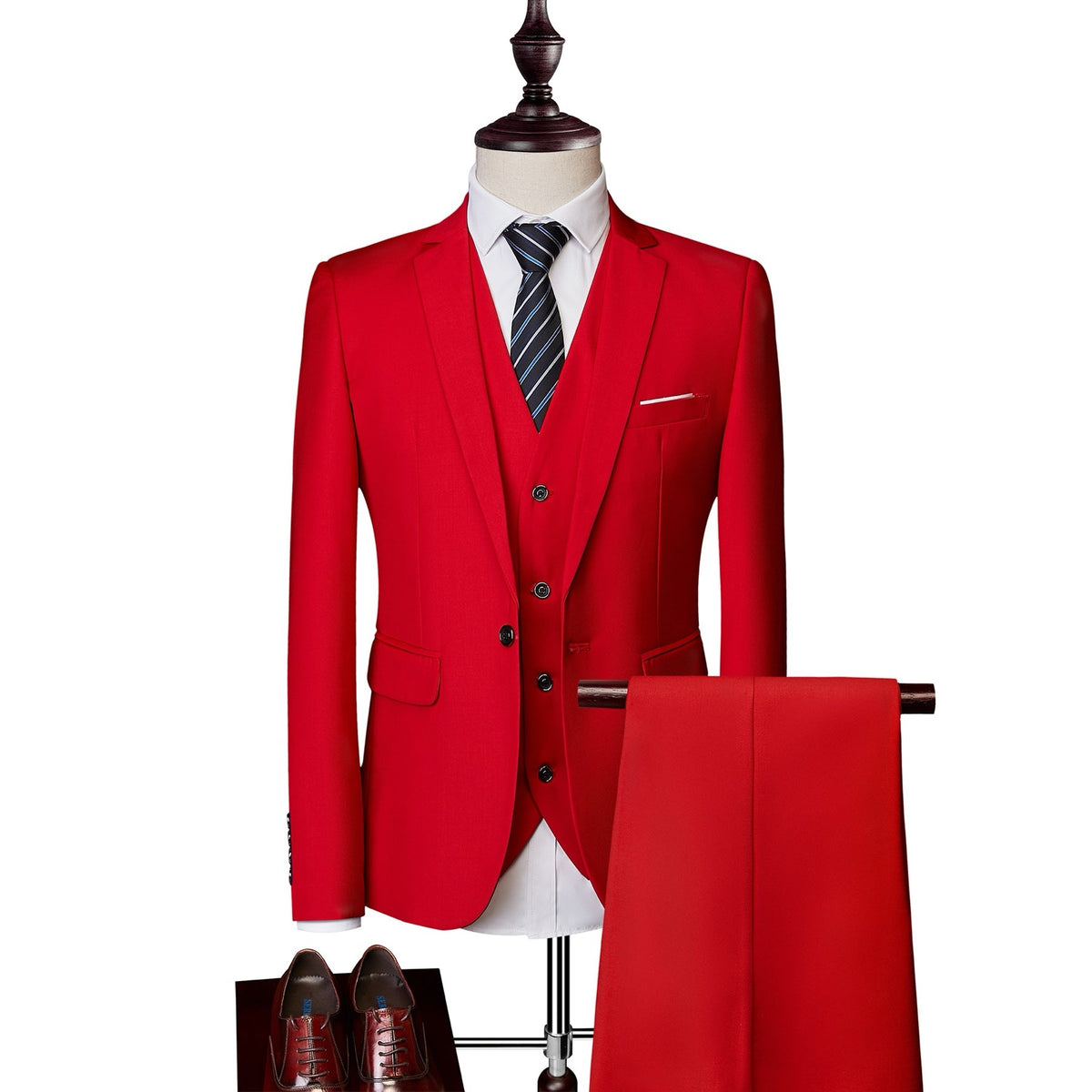 A collection of men's slim fit 3 piece suits in various colors, including blue, pink, white, red, and more, displayed on