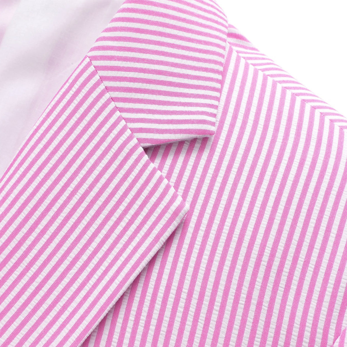Front view of a men's two-piece pink and white striped seersucker suit with a single-breasted jacket and matching trousers.