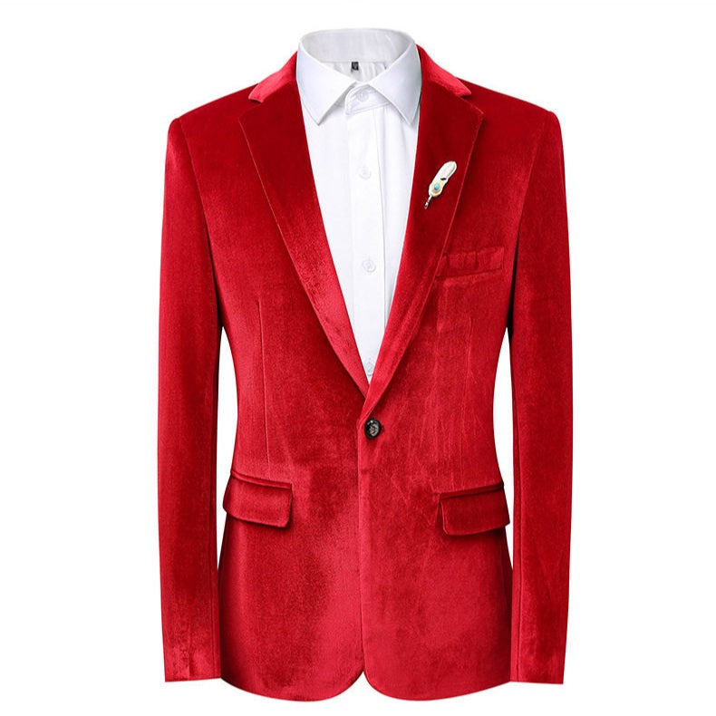A collection of men's velvet suits in blue, red, gold, purple, and green, each featuring a one-button blazer with a feather