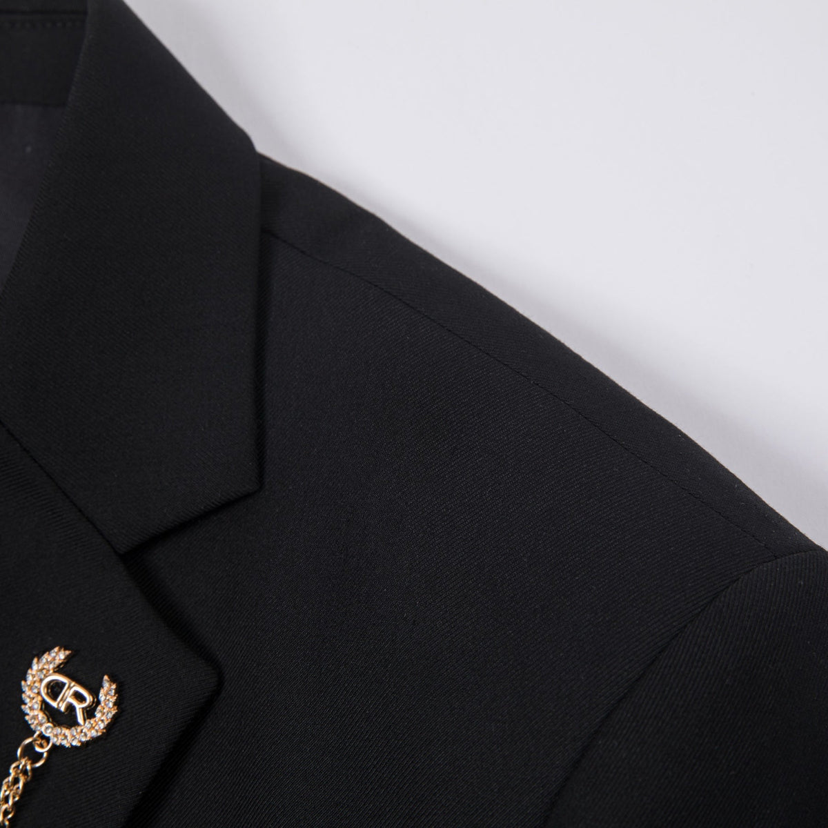 Full view of a Suitmine Men's Black Slim Fit 3-Piece Suit on a mannequin, featuring a blazer, vest, and trousers, accented