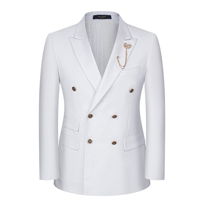 A men's white double-breasted suit with gold buttons, peaked lapels, and a decorative brooch, displayed on a mannequin.