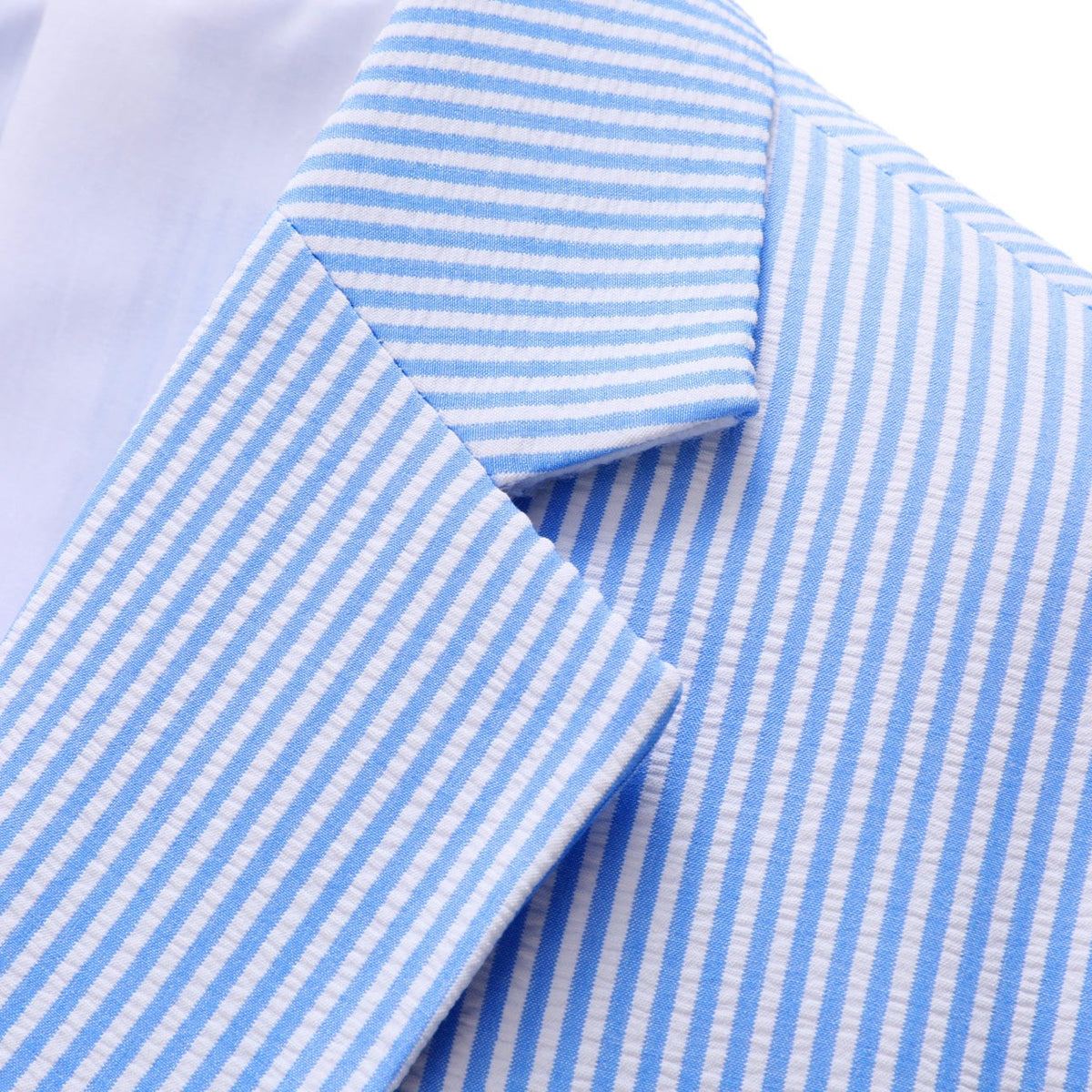 Front view of a men's light blue and white striped seersucker suit, including a single-breasted jacket and matching trousers.