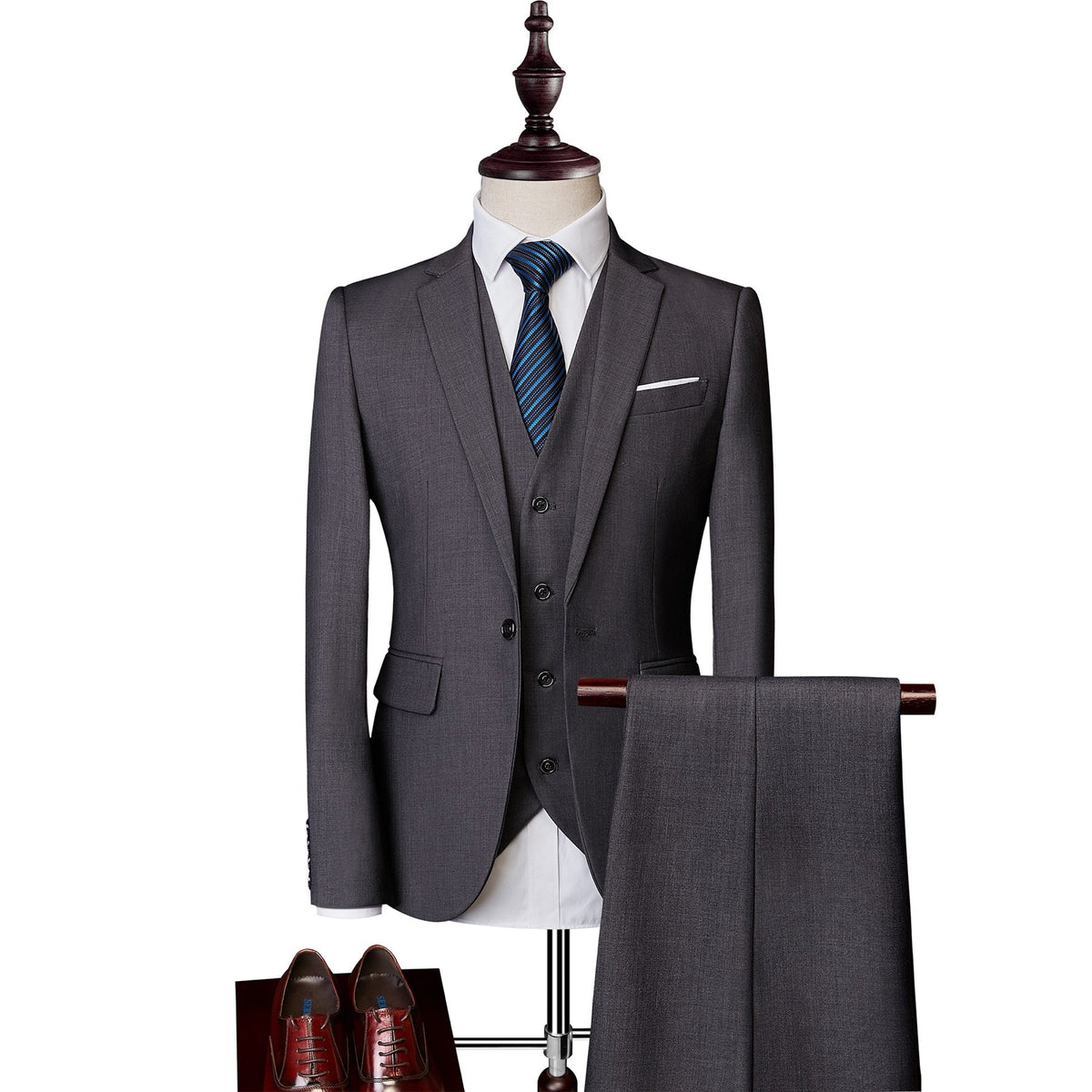 A collection of men's slim fit 3 piece suits in various colors, including blue, pink, white, red, and more, displayed on