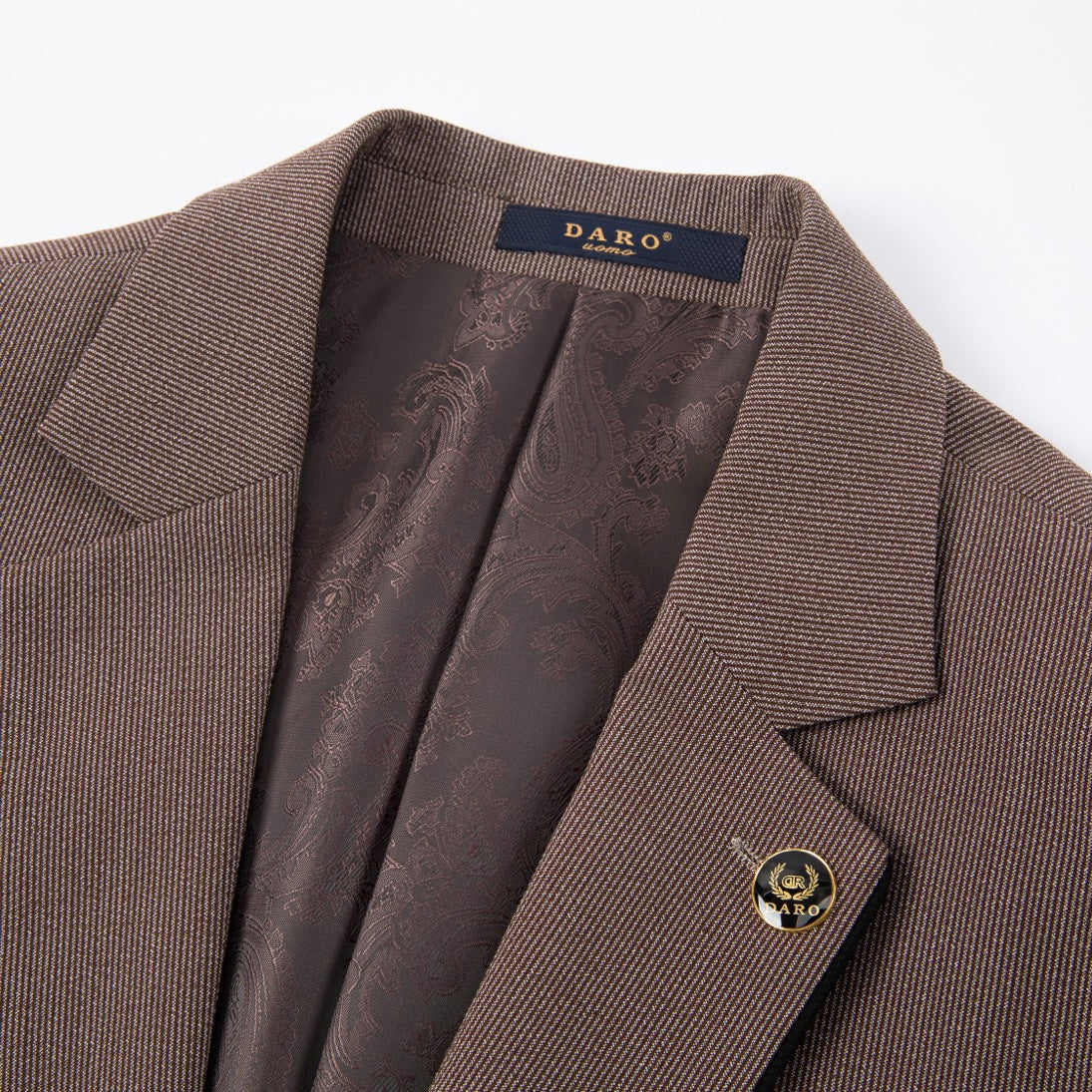 Men's brown three-piece suit with black contrast trim, including a jacket, vest, and trousers, displayed on a mannequin.