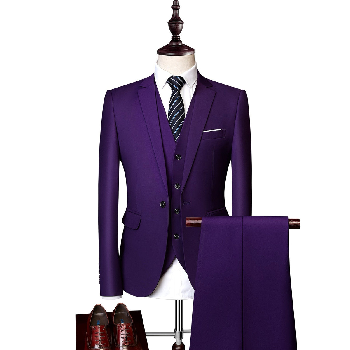A collection of men's slim fit 3 piece suits in various colors, including blue, pink, white, red, and more, displayed on