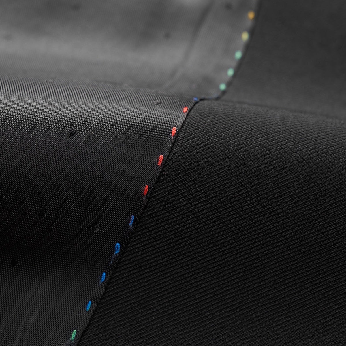 A collection of Suitmine men's mandarin collar suits in black, beige, dark green, and navy blue, featuring textured trim