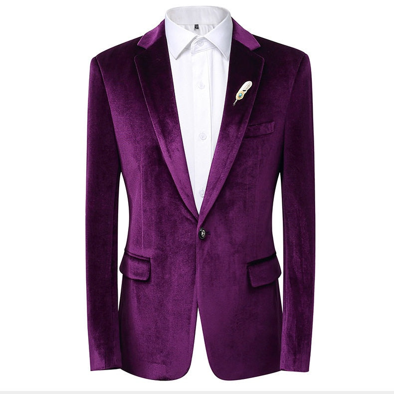 A collection of men's velvet suits in blue, red, gold, purple, and green, each featuring a one-button blazer with a feather