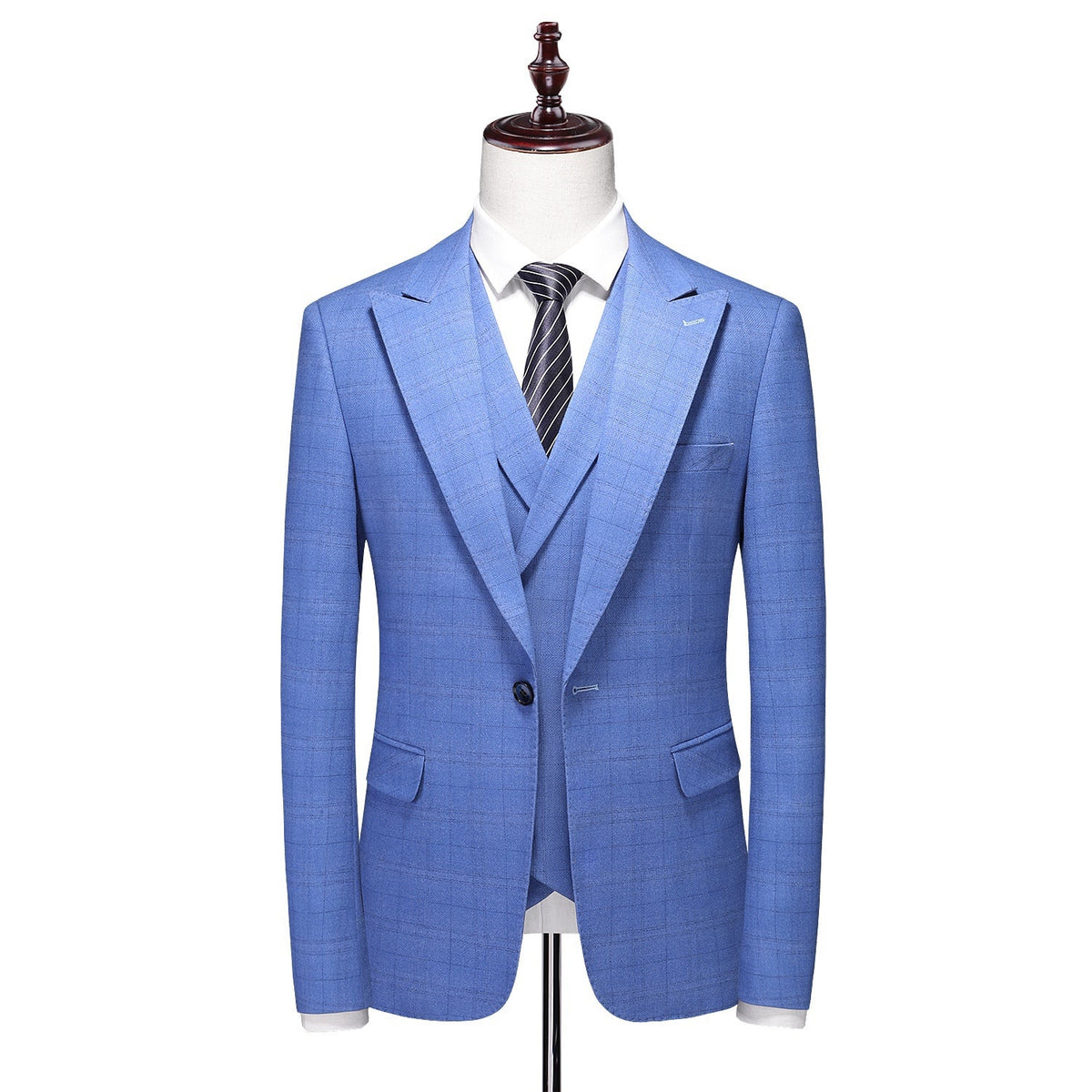 Full view of a men's blue plaid three-piece suit including jacket, double-breasted vest, and trousers, styled on a mannequin.